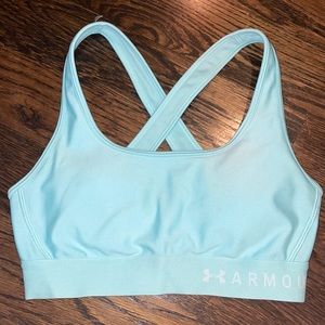 Tiffany Blue colored crossover sports bra from Under Armour